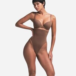 Skims High Waisted Thong in Size Small The color is Jasper